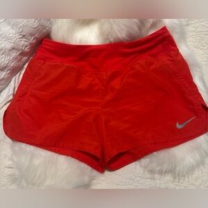 Nike Women's Red Running Shorts Size M.